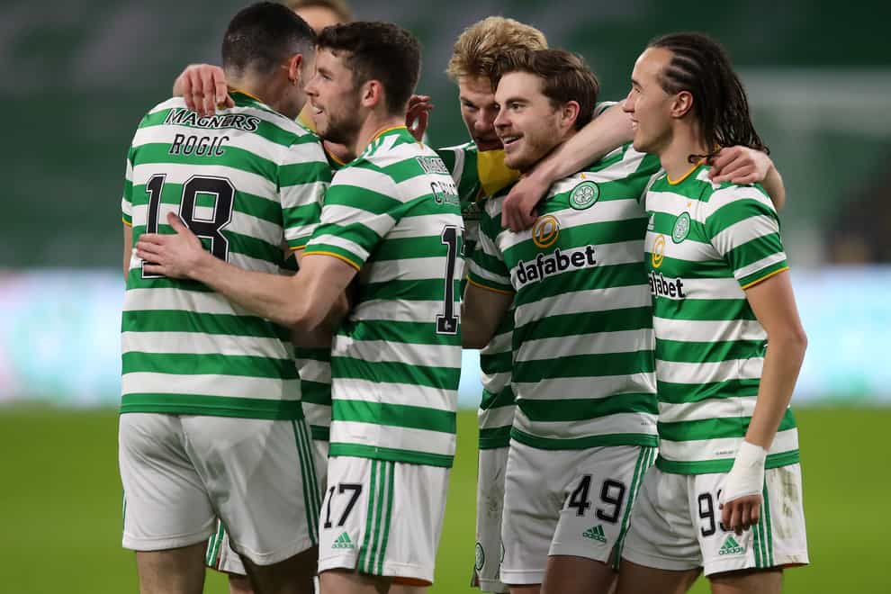 Celtic’s James Forrest (second right) opens scoring against Falkirk
