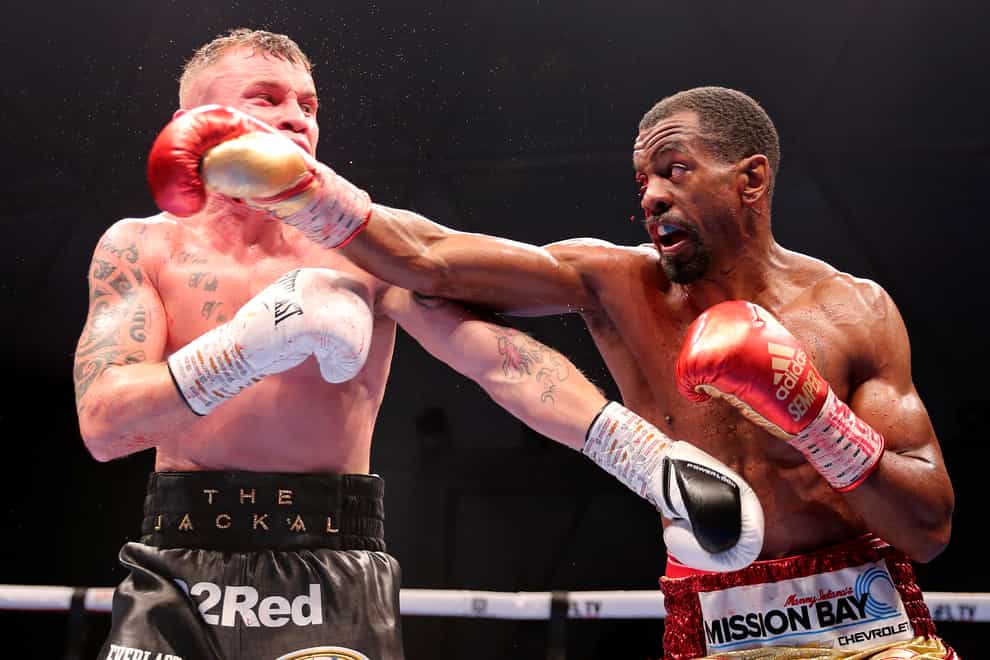 Carl Frampton (left) retired after losing his world title fight to Jamel Herring