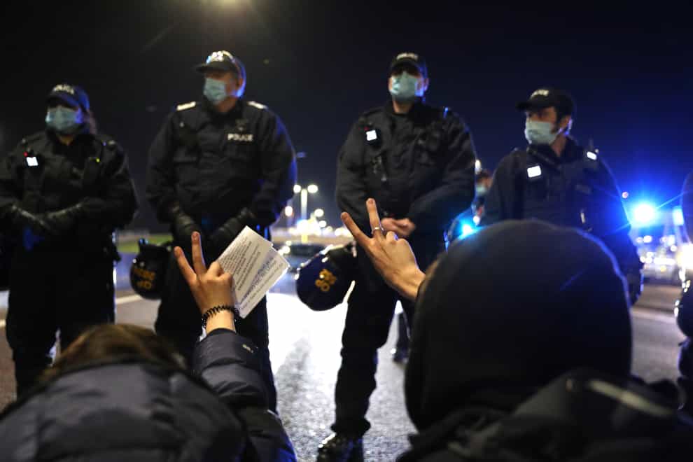 Police face demonstrators on the A4032 which leads to the M32 in Bristol during a ‘Kill The Bill’ protest