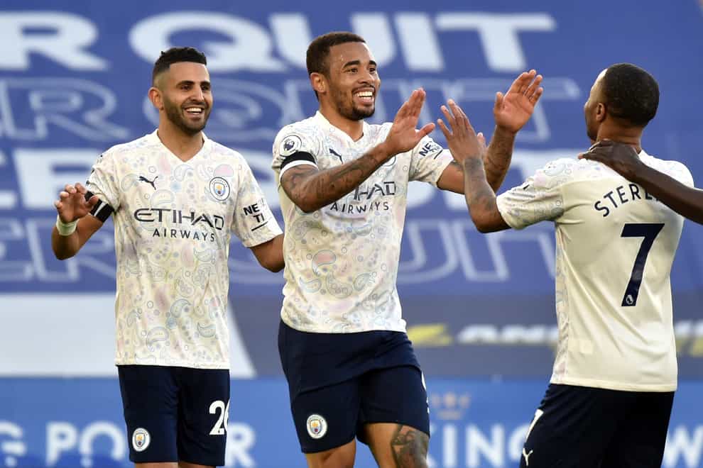 Gabriel Jesus, centre, celebrates scoring Manchester City's second goal at Leicester