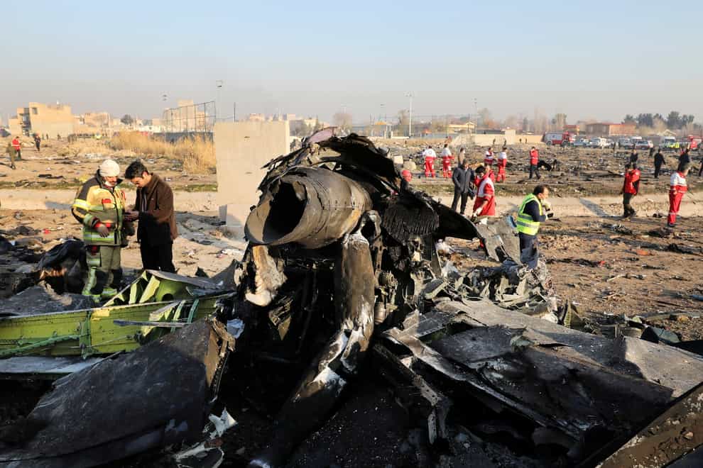 Debris at the scene where a Ukrainian plane crashed in Shahedshahr, south-west of Tehran, Iran