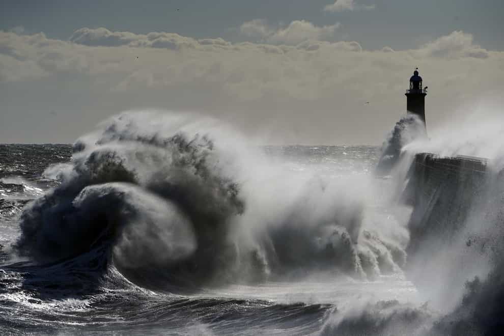 Waves from the North Sea crash against the Tynemouth Lighthouse
