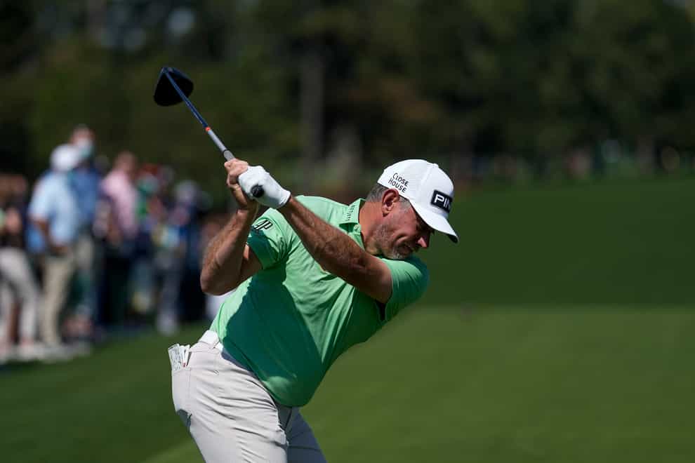 Lee Westwood hits his tee shot on the first hole during a practice round for the Masters
