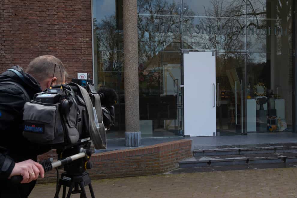 The glass door which was smashed during a break-in at the Singer Museum in Laren, Netherlands (Peter Dejong/AP)