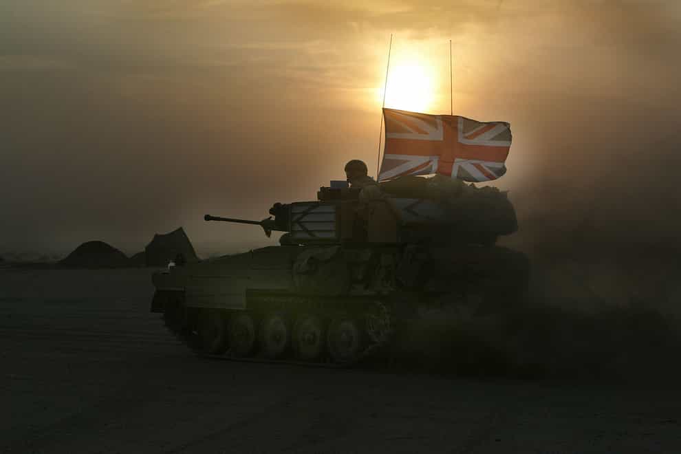A light armoured vehicle carrying a Union flag