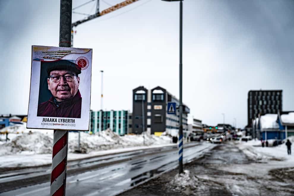 An election candidate’s advertising poster for the election in Greenland (Emil Helms/AP)