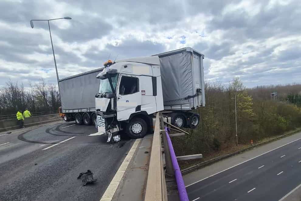 An HGV after it collided with the side of the M25 at Junction 2