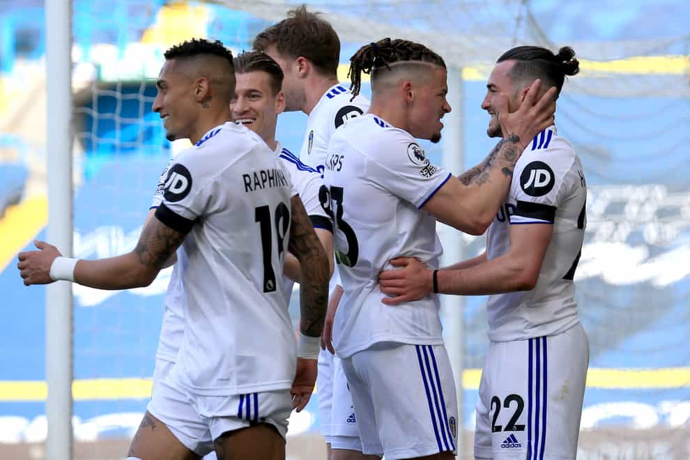 Jack Harrison, right, is congratulated by his Leeds team-mates after scoring in last week's home win against Sheffield United