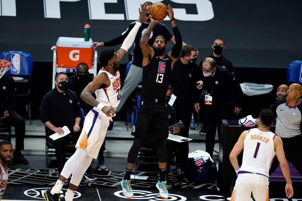 Los Angeles Clippers guard Paul George makes a 3-pointer
