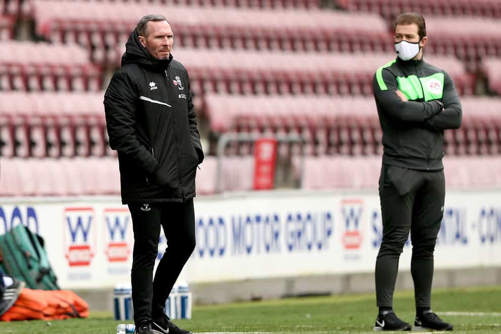 Michael Appleton saw Lincoln's games with MK Dons and Charlton postponed due to an outbreak of coronavirus cases at the club