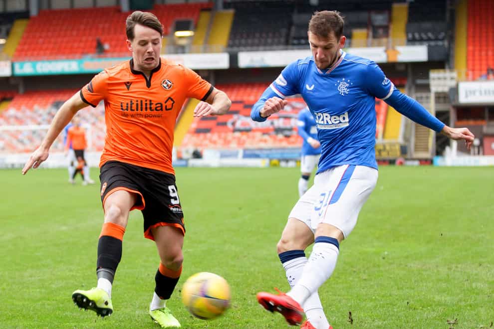 Dundee United’s Marc McNulty (left) was on target