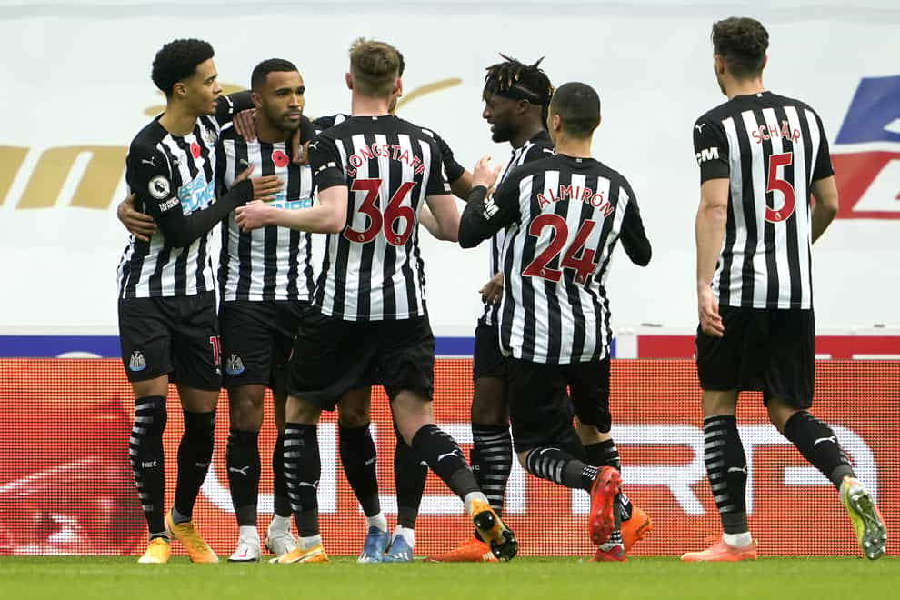 Newcastle players celebrate a goal