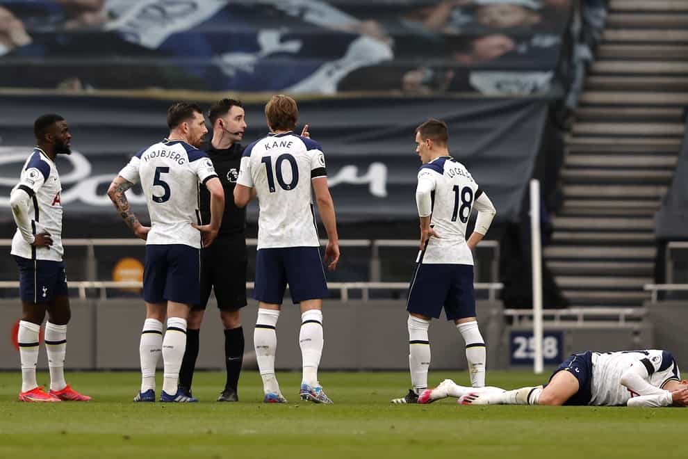 Son Heung-min, right, fell to the ground holding his face as Manchester United thought they had opened the scoring