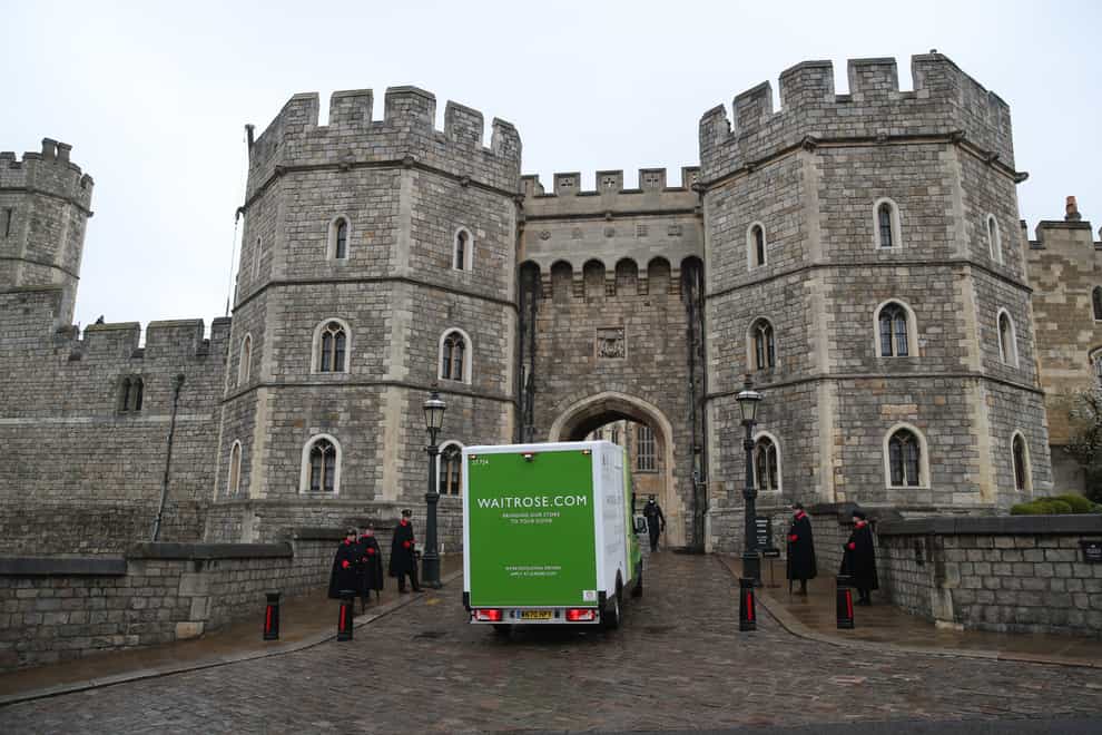 A Waitrose delivery van arrives at the entrance to Windsor Castle