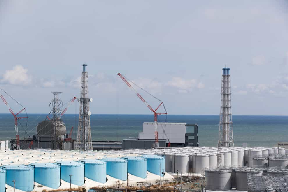 The Pacific Ocean looks over nuclear reactor units of No. 3, left, and 4 at the Fukushima Daiichi nuclear power plant in Okuma town, Fukushima prefecture