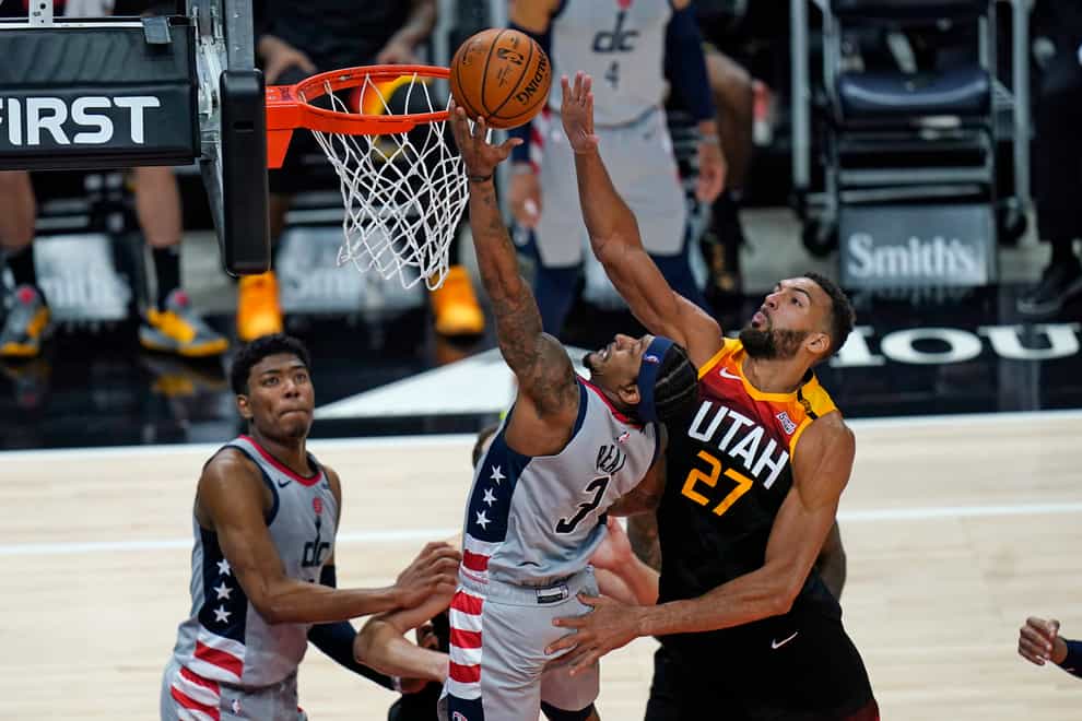 Washington Wizards guard Bradley Beal (3) lays up the ball as Utah Jazz centre Rudy Gobert (27) defends