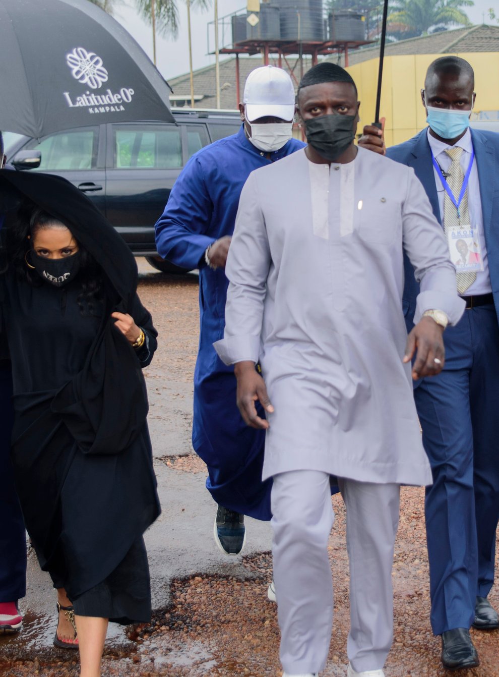 Akon, right and his wife Rozina, arrive at the Gaddafi National Mosque in Kampala, Uganda