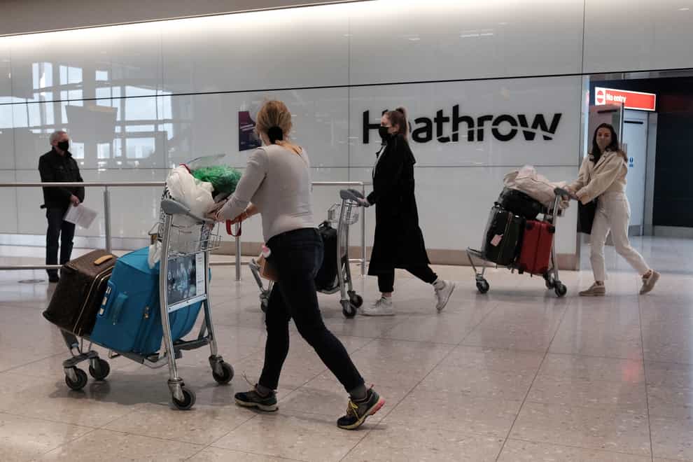 Passengers at Heathrow Airport