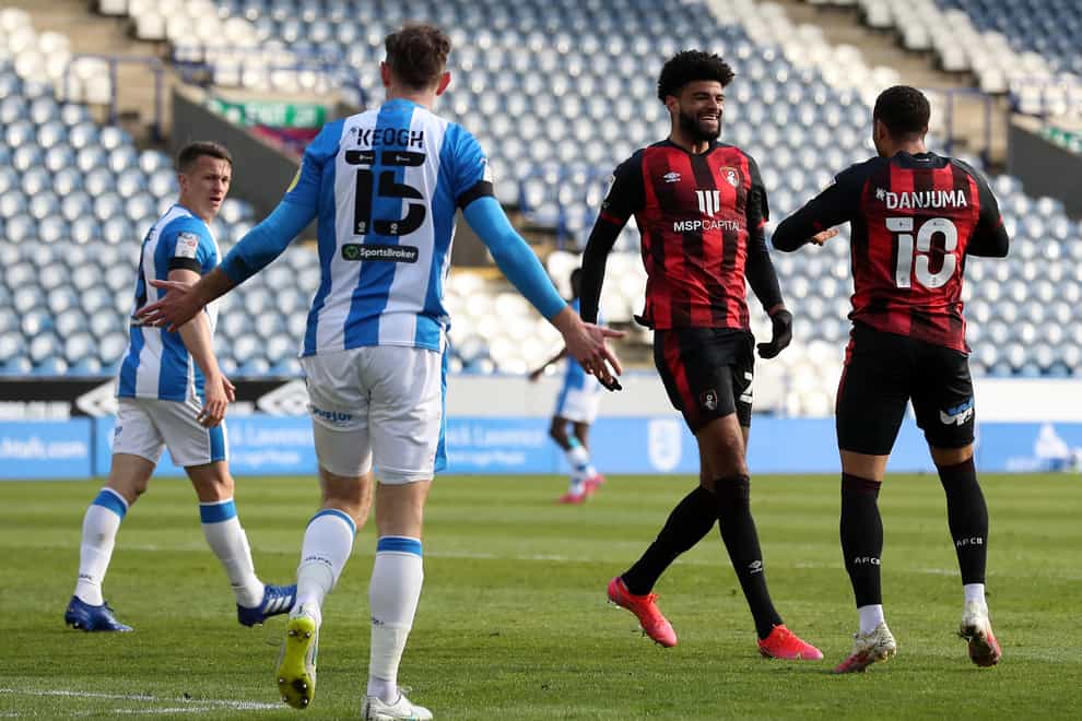 Bournemouth’s Philip Billing, centre right, celebrates scoring against his old club
