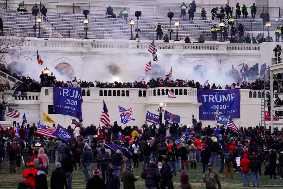 People storm the Capitol in Washington on January 6