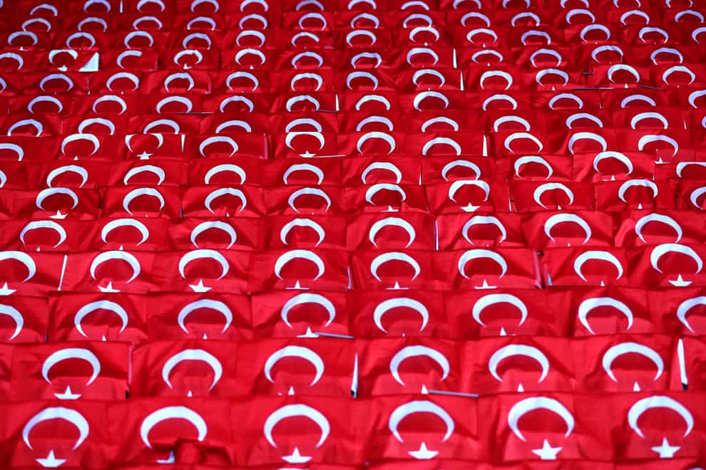 Turkeish flags on seats at a football match