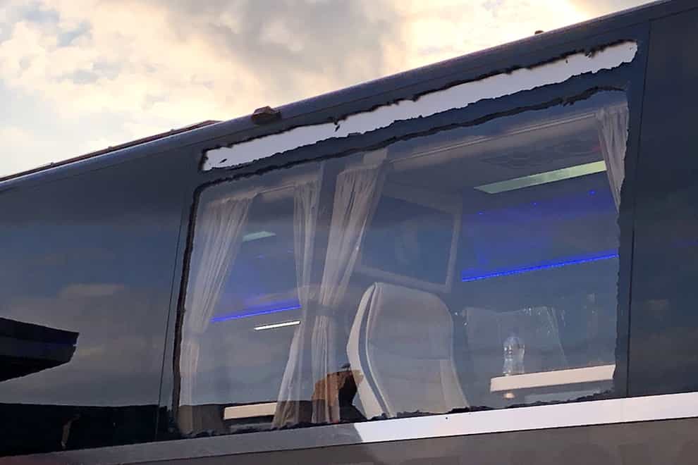 A window of the Real Madrid team coach was smashed outside Anfield