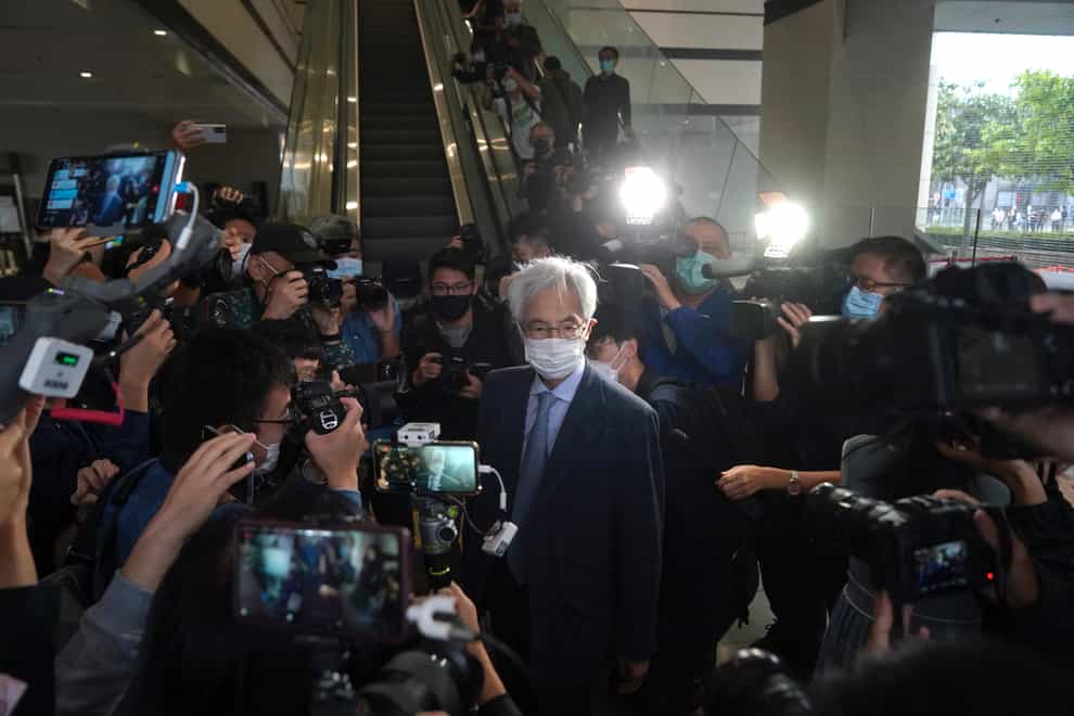 Pro-democracy activist Martin Lee, centre, arrives at a court in Hong Kong (Kin Cheung/AP)