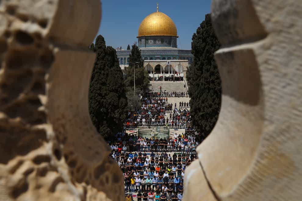 Palestinian worshipers pray during the first Friday of the holy month of Ramadan at the al Aqsa Mosque compound in Jerusalem’s old city (Mahmoud Illean/AP)