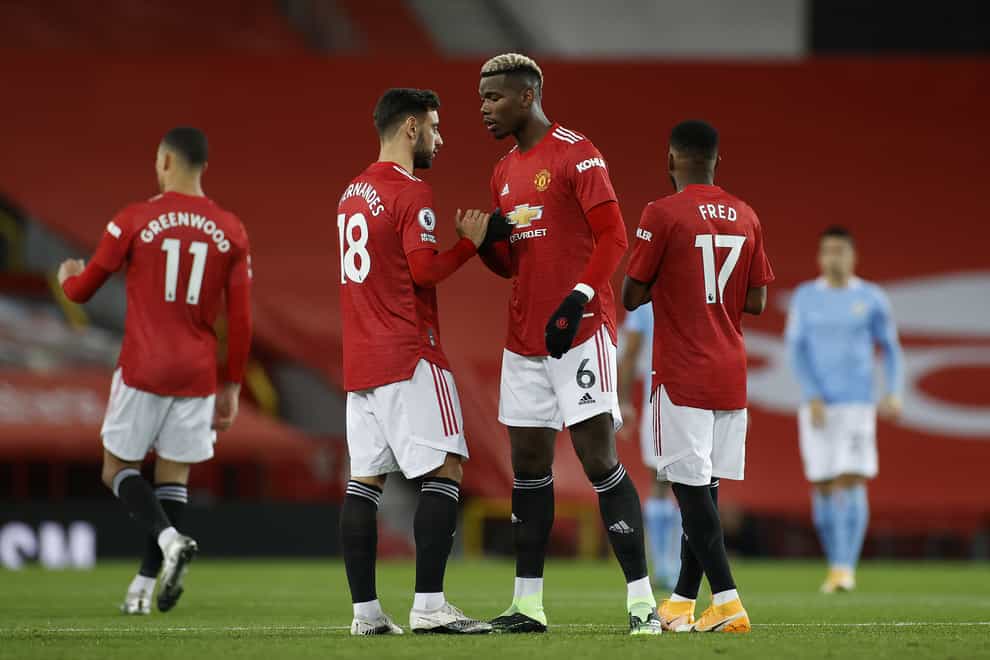 Paul Pogba, right, and Bruno Fernandes, left, have helped Man Utd to the Europa League semi-finals