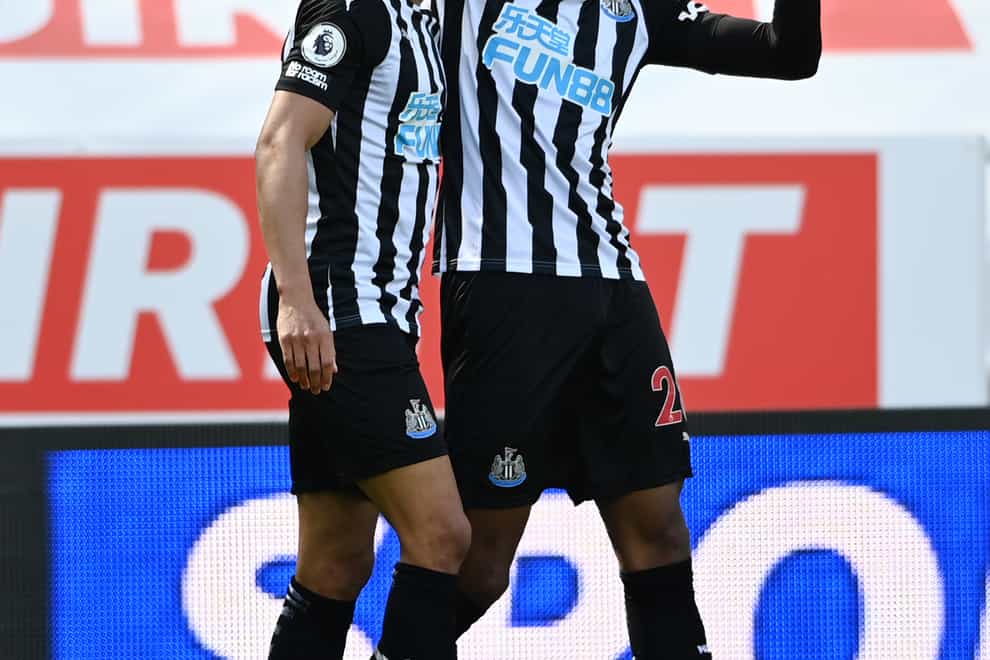 Newcastle’s Joe Willock, right, celebrates his late winner against West Ham