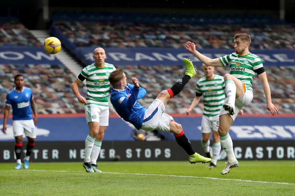 Rangers’ Steven Davis (centre) scores against Celtic