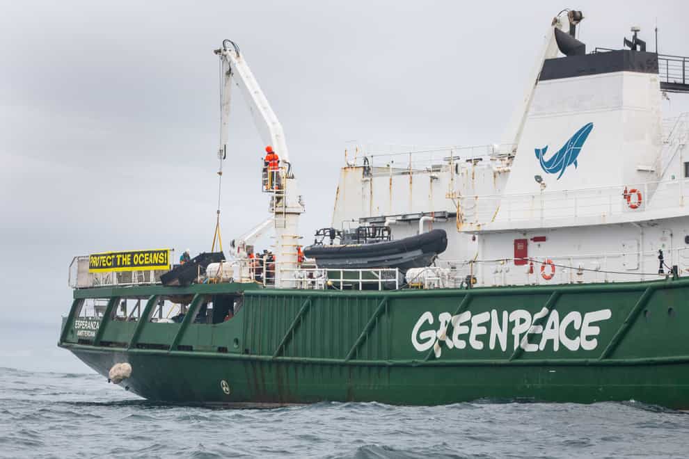 Greenpeace vessel putting boulders into the sea in the Dogger Bank