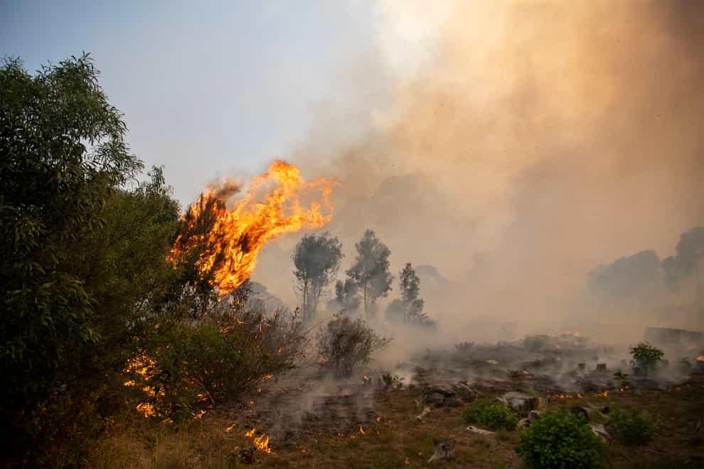 A fire rages out of control on the slopes of Table Mountain in Cape, South Africa