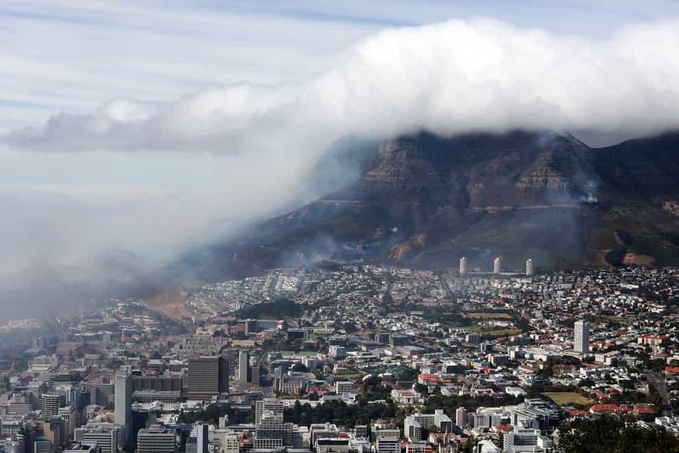 Clouds of smoke are seen above the city of Cape Town, South Africa