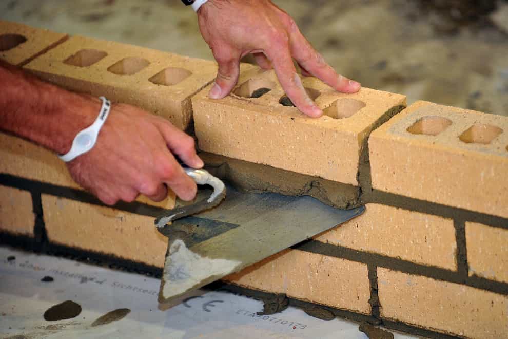 A trainee bricklayer at work (Ian Nicholson/PA)
