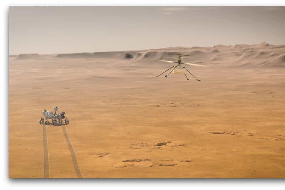 Artist’s impression issued by Nasa of their Mars 2020 Perseverance rover and Ingenuity Mars helicopter (Nasa-JPL-Caltech/AP)