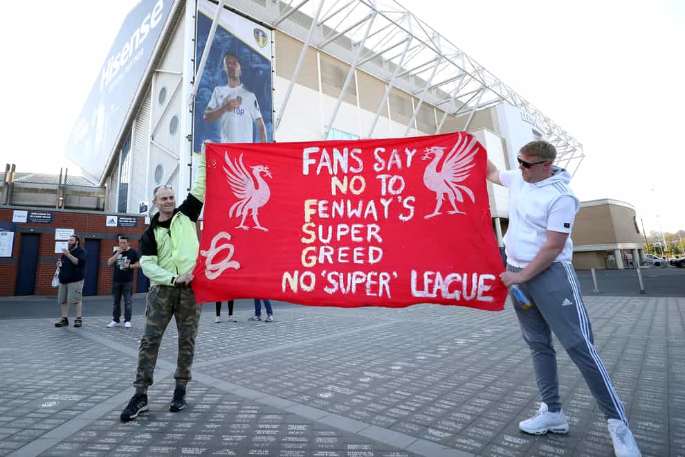 Fans protest outside the Leeds stadium against Liverpool’s decision to join a proposed new European Super League ahead of the clubs' Premier League fixture