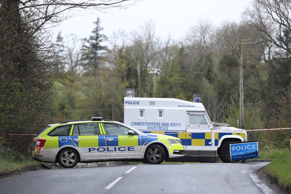 PSNI vehicles blocking a road during the security operation