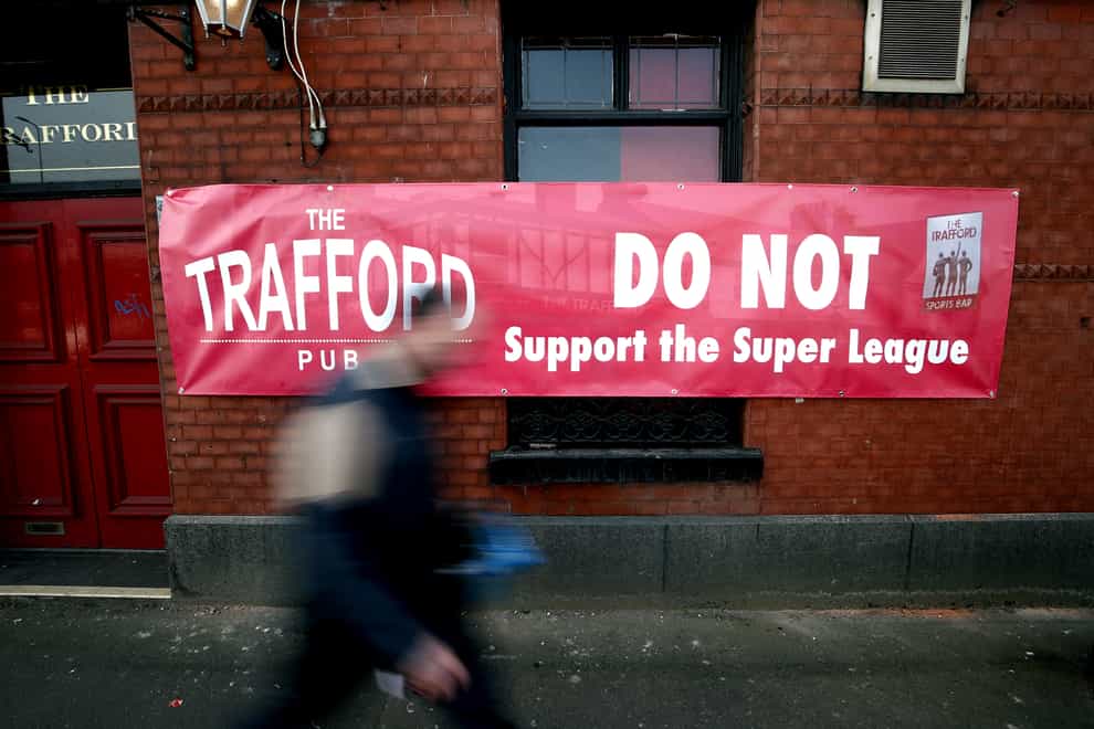 A banner outside of the Trafford pub in Manchester objecting to the decision of Manchester United joining the European Super League