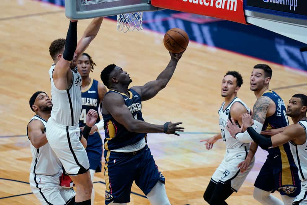 New Orleans Pelicans forward Zion Williamson goes to the basket in the second half of an NBA basketball game against the Brooklyn Nets