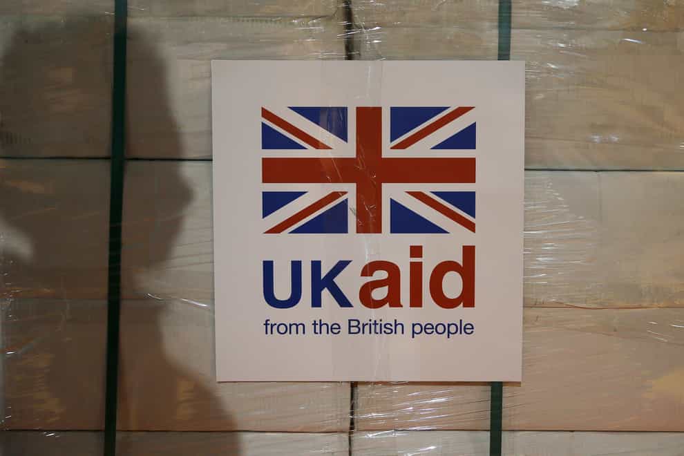 A UK aid label attached to a box containing kitchen sets at a UK aid Disaster Response Centre