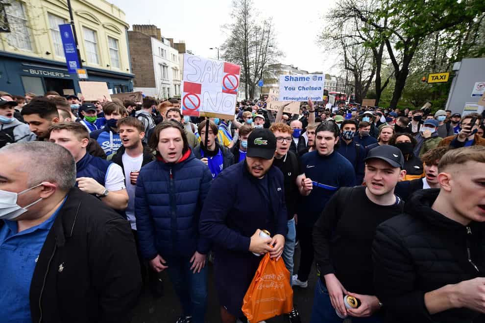 Chelsea fans protest against the Super League ahead of their match against Brighton on Tuesday