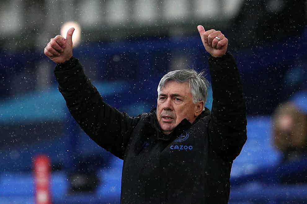 Everton manager Carlo Ancelotti sticks both thumbs in the air