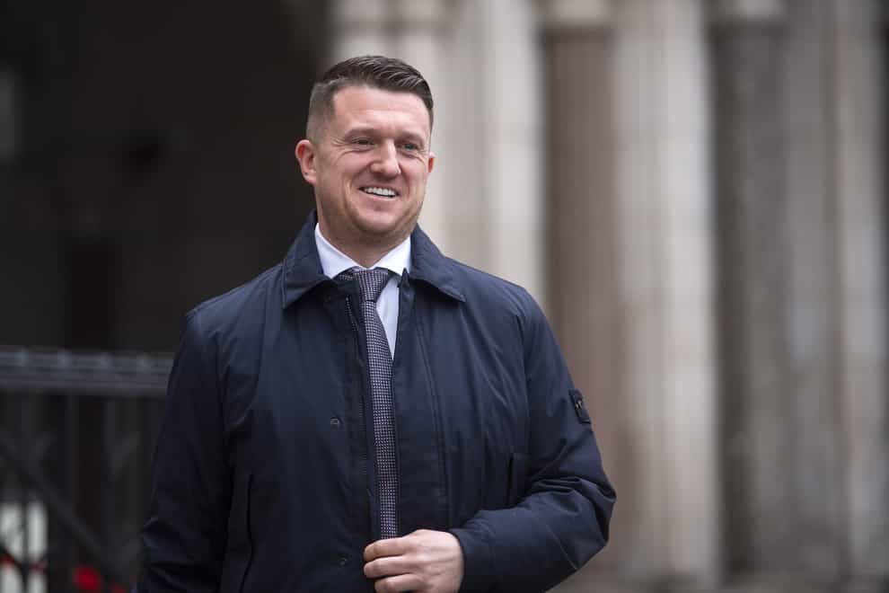 Tommy Robinson leaving the Royal Courts of Justice