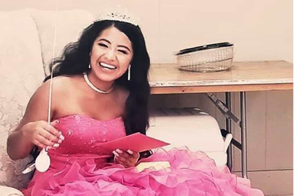 Adriana Palma wears a tiara and ballgown on her quinceanera, her 15th birthday celebration