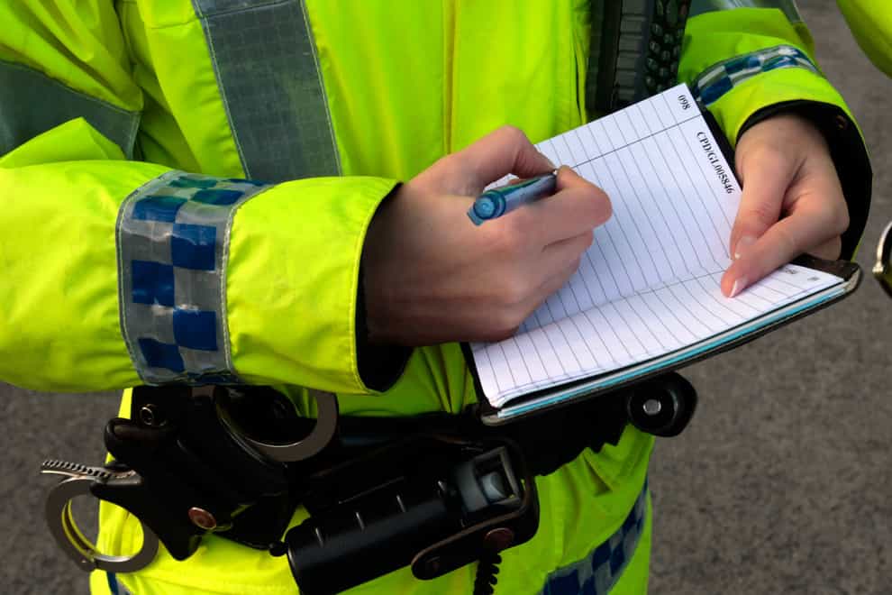 Police officer with notebook
