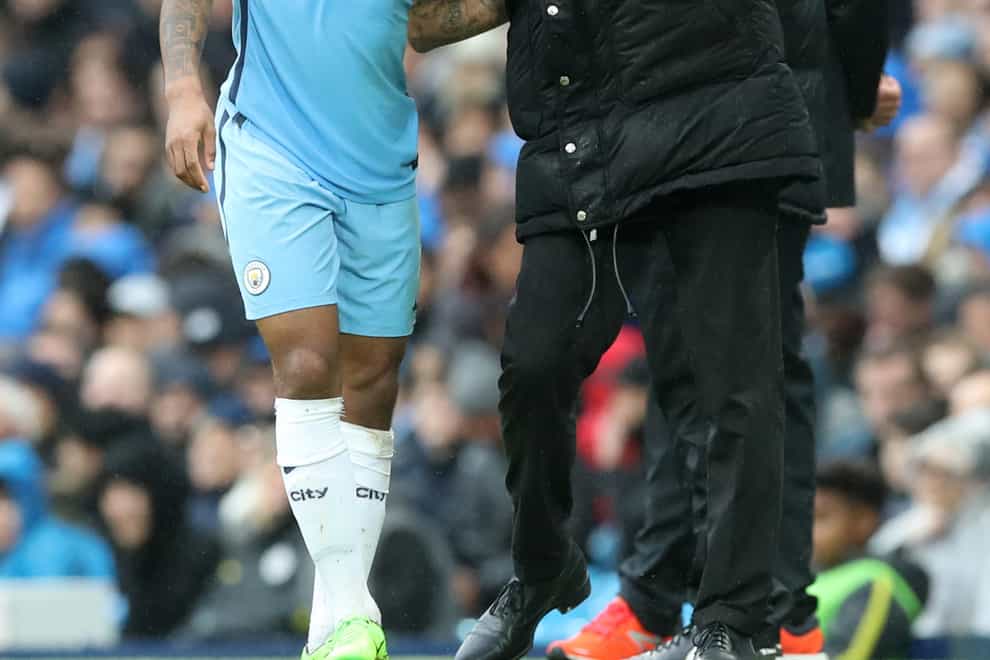 Manchester City manager Pep Guardiola says Raheem Sterling, left, will get his chances to impress