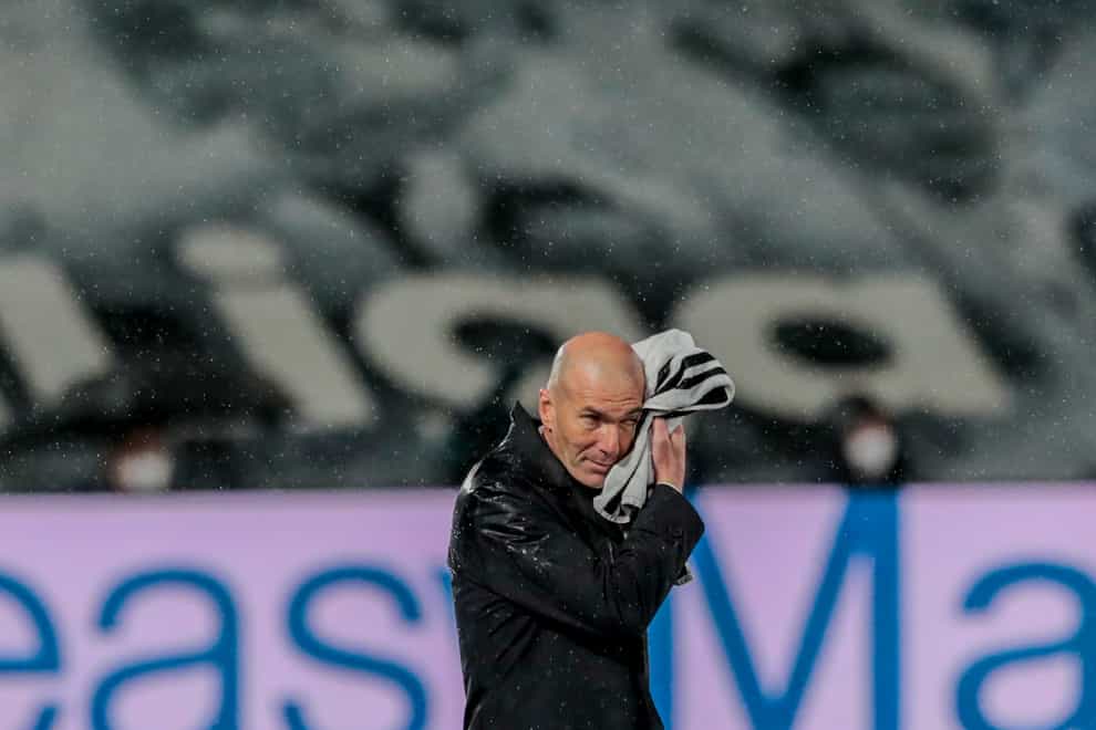 Real Madrid’s head coach Zinedine Zidane uses a towel during a goalless LaLiga draw with Real Betis