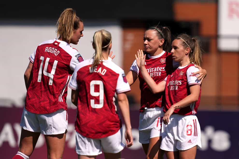 Arsenal’s Jordan Nobbs (right) celebrates scoring their side’s first goal of the game with team-mates during the FA Women’s Super League match at Meadow Park, Borehamwood