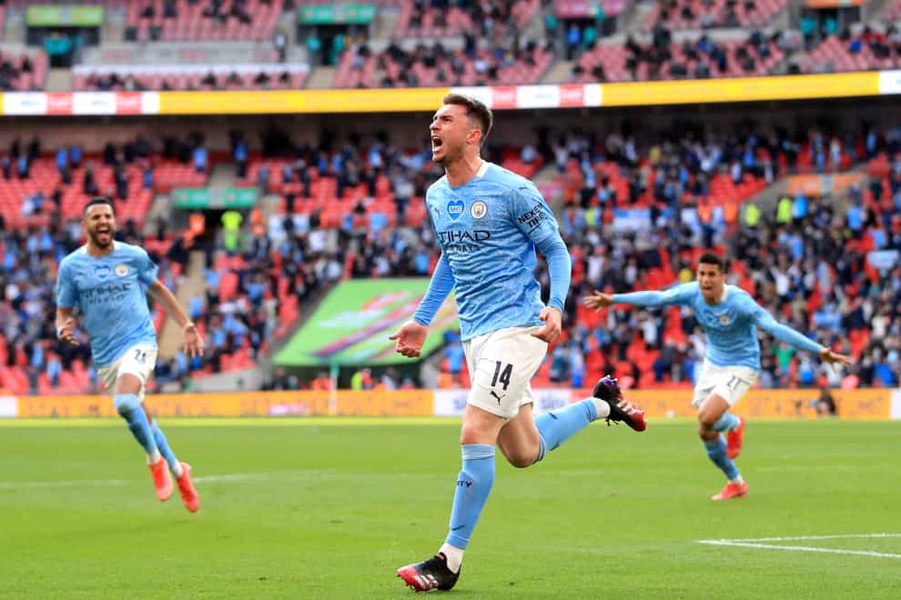 Manchester City’s Aymeric Laporte celebrates scoring the winner